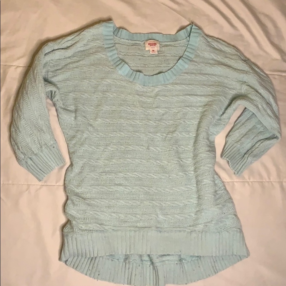 Light blue sweater